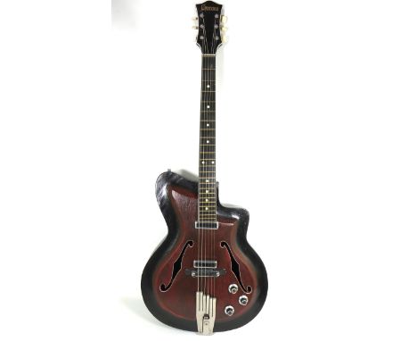Rare, Vintage Cremona Soviet Made Accoustic/Electric Guitar. In fair condition in Oak Tan, In light worn condition. Sounds go