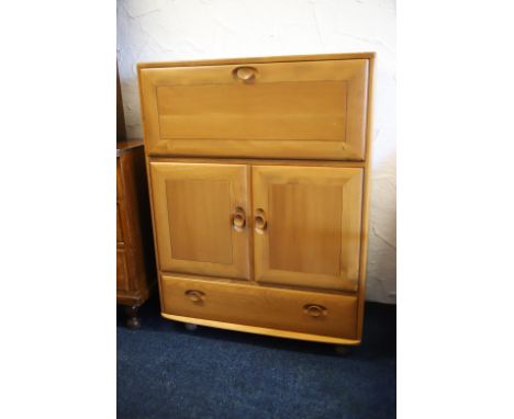 Ercol 'Windsor' Blonde Elmwood Bureau which measures H:43 x W:32 x D:18 inches deep. In very good condition. See photos. 