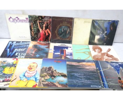 Fifteen Vintage Rock &amp; Pop LP's by Artists such as Clannad, Roxy, Santana Alan Parson's Project etc. see photos