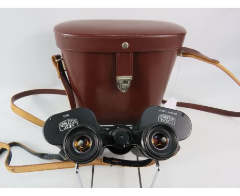 Pair of Carl Zeiss Jenoptem 10 x 50 binoculars with case.