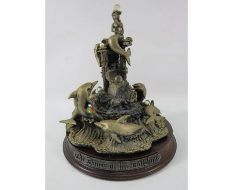 Myth and Magic sculpture " The Dance Of The Dolphins" with wooden base, 10.5" tall. Very Heavy !.