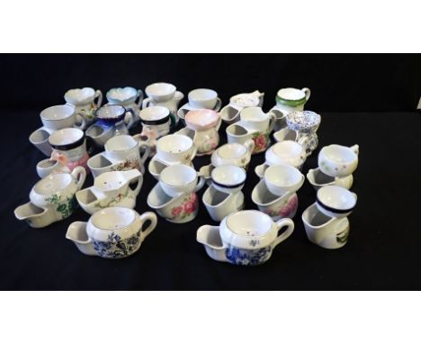 A COLLECTION OF CERAMIC SHAVING MUGS Victorian and later