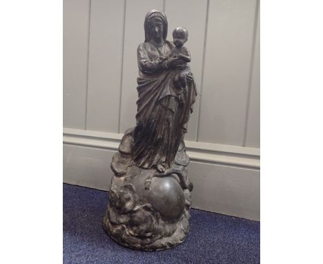 A 19TH CENTURY VIRGIN AND CHILD STATUE the Virgin standing on the globe, trampling a serpent, spelter, 43cm high