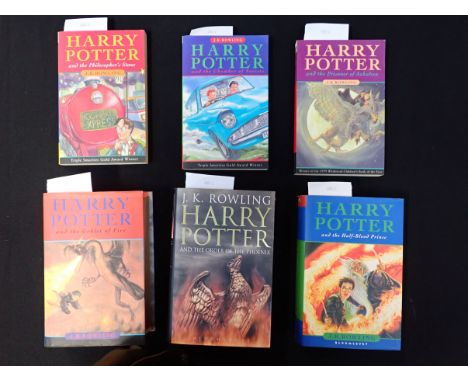 J.K. ROWLING: SIX HARRY POTTER BOOKS, INCLUDING THREE HARDBACKS two of which state 'first edition', and three paperback, all 