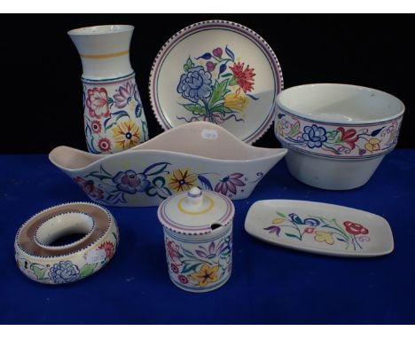 A GROUP OF POOLE POTTERY traditionally painted (7)