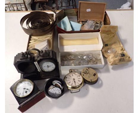 A COLLECTION OF CLOCK AND WATCH COMPONENTS springs, glasses, keys tools, faces etc