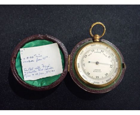 A LEATHER-CASED POCKET BAROMETER by Lennie, Edinburgh