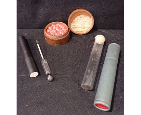 A SET OF ALCOHOL PROOFING FLOATS (CASED), AND A LACTOMETER or hydrometer (cased)