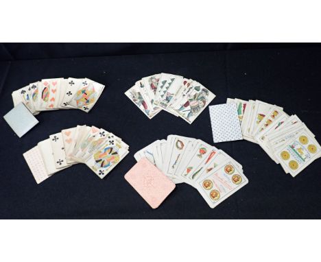FRENCH AND ITALIAN 19TH CENTURY PLAYING CARDS mostly wood block printed and hand coloured, five sets