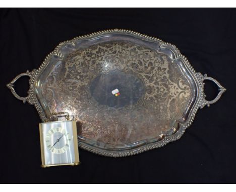 A SILVER PLATED TRAY 78 cms wide&nbsp;and a quartz carriage clock
