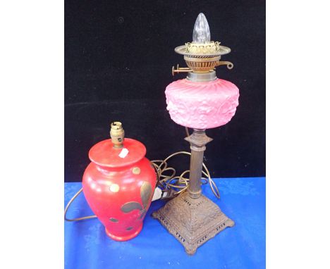A CONVERTED VICTORIAN OIL LAMP TOGETHER WITH MODERN CERAMIC LAMP 