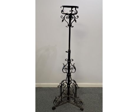 A 19TH CENTURY WROUGHT IRON TELESCOPIC OIL LAMP STANDARD 