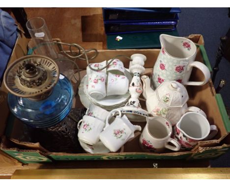 A VICTORIAN OIL LAMP WITH CAST-IRON BASE (converted to electricity), an Edwardian tea set, and other items