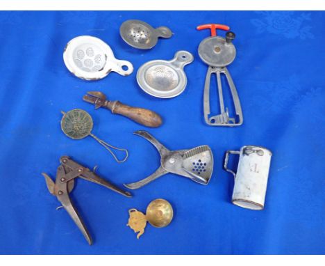 A COLLECTION OF VINTAGE KITCHEN TOOLS including a Bunny whisk, strainers, tin openers etc