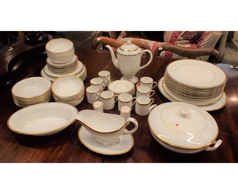 A ROYAL WORCESTER 'VICEROY' DINNER SERVICE with gold rim, six settings plus some extras, including coffee pot and cups and sa