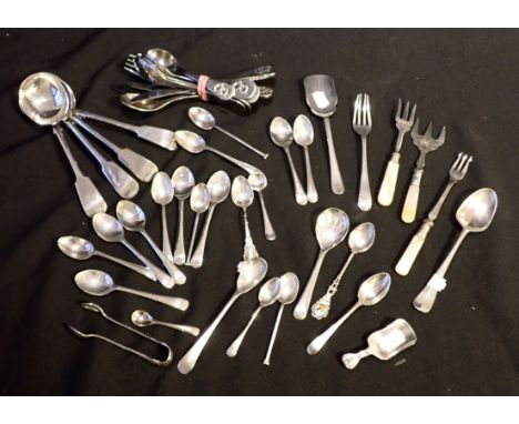 AN 18TH CENTURY DUBLIN SILVER DESSERT SPOON BY CHRISTOPHER SKINNER incompletely hallmarked, a silver caddy spoons and a selec