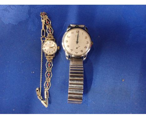 A LADY'S ROTARY GOLD COLOURED METAL WRISTWATCH with 9ct gold and garnet set strap, together with a vintage gents Timor wristw