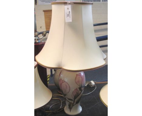 Moorcroft Art Pottery baluster shaped lamp base, tube lined with flowers and foliage and with fabric shade.(B.P. 24% incl. VA