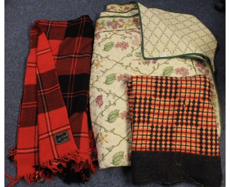 A modern floral double sided, double size floral pattern quilt, together with two vintage blankets; a red and black check fri