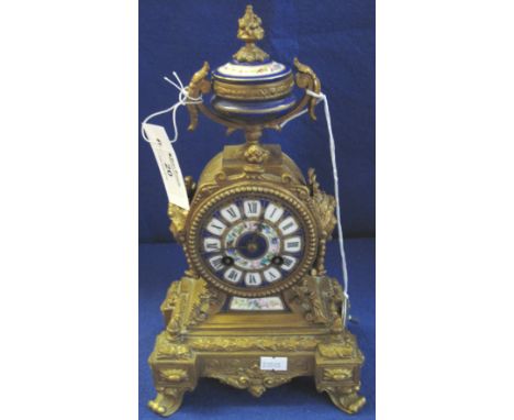 19th Century French gilt, spelter, porcelain mounted two train mantel clock, brass drum movement striking on one bell, with k