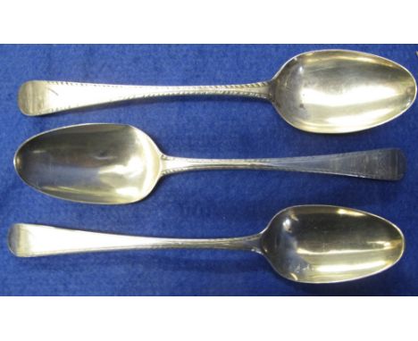 Group of three 18th Century silver tablespoons with feather edged decoration, 7.5oz approx.(B.P. 24% incl. VAT)