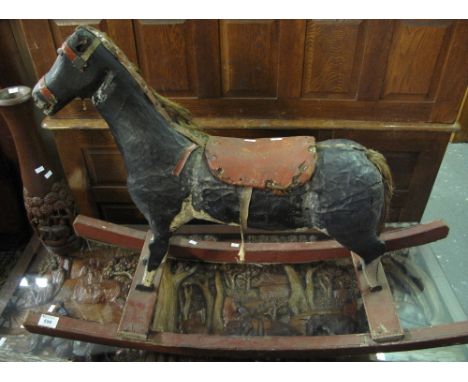 Small vintage wooden and papier mache wooden and painted rocking horse.(B.P. 24% incl. VAT)