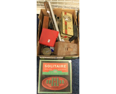 Box of oddments to include: solitaire game; wooden and tin boxes; odd tools; brass gauge; vintage iron; model aeroplane engin