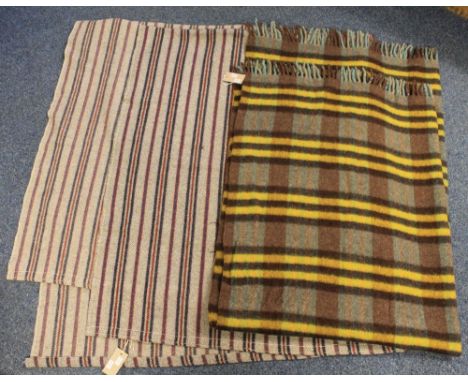 Two vintage woollen blankets: a grey ground stripy double blanket and a yellow, blue and brown Welsh single fringed blanked w