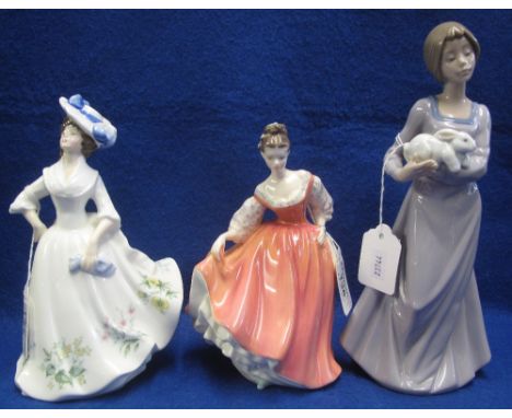 Three bone china or porcelain figurines to include: Royal Doulton 'Fair Lady' (coral pink), HN2835; Royal Doulton 'Adele', HN