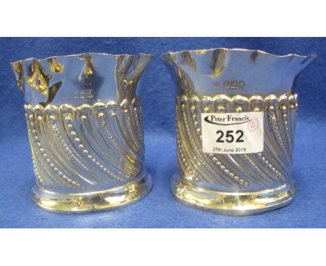 Pair of silver straight sided, wrythen decorated, crimped edge, straight sided vases, London hallmarks, probably William Comy