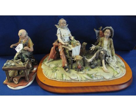Capodimonte study of a cobbler at his work bench, together with a large Capodimonte group, two tramps around a camp fire, wit