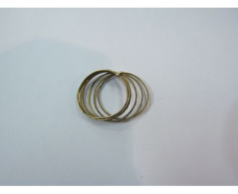 A gold ring with seven bands linked together, stamped 14k, 2.1g