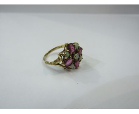 A 9ct gold ruby and opal cluster ring. Size P, 3.6g