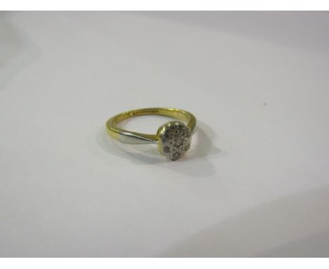 An 18ct gold platinum set diamond ring. Size I, 2.4g