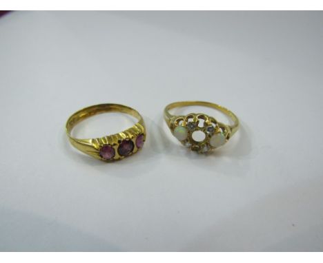 An 18ct gold ring stones missing and a ruby set ring a/f, 5g