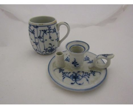 A 'Tettau' blue and white porcelain mug and chamber stick with striker 'strawflower' pattern  (2)
