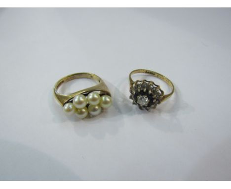 A 9ct gold ring set with six pearls. Size N and a sapphire cluster ring, 6.5g