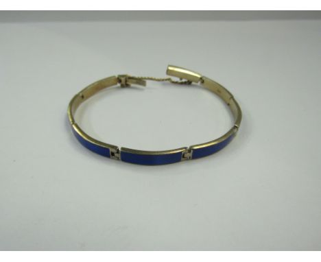 A silver bracelet with blue guilloche enamel panels, stamped 935s