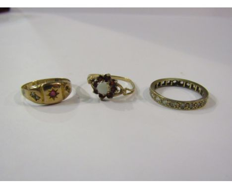 Three rings including 9ct gold ruby and seed pearl (split) paste set eternity ring and opal and garnet a/f 