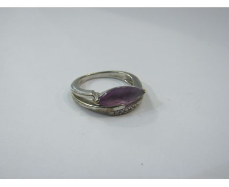 A 9ct white gold ring with facet cut amethyst and diamond chips. Size O, 4.4g