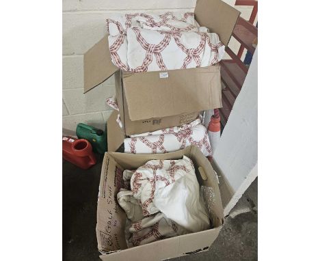 Three boxes of lined curtains with ribbon design