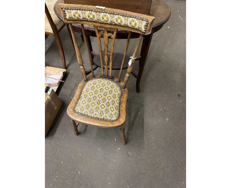 An early 20th Century stick back and tapestry upholstered bedroom chair