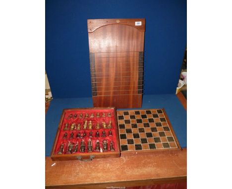 A rare 20th century K and C London shove halfpenny board game (24" x 13"), plus an early 20th c. brass and copper Chess set c