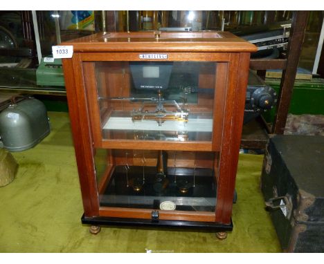 A Mahogany cased Oertling scientific (micro-balance) Scales, model 141, serial no. 45458, 19" tall x 16" wide x 11" deep.