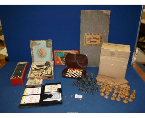 A small quantity of games including Elephant brand Dominoes, Pocket Chess, chess and draughts board and playing card caddy .