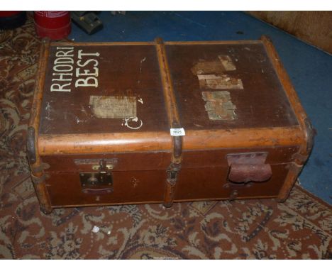 A large bentwood wood and canvas Trunk with metal fastening, luggage labels, a/f. 30" long x 19" x 13".