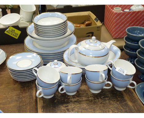 A Royal Doulton blue and white dinner/tea service including seven dinner plates, eight bowls, two serving dishes, two serving