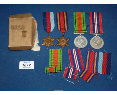 Four World War II War medals; 1939-45 Star, Burma Star, Defence medal and World War medal 1939-45, plus some remnants of ribb