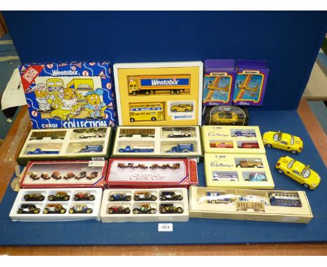 A box of model cars and models to include Corgi 'Weetabix', Corgi 'Cadburys', Days Gone, Classic Cars, three Toyota MR2's, et