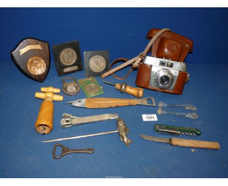A quantity of miscellanea including Regatta medals, novelty bottle openers, corkscrews, Agfa camera, etc.